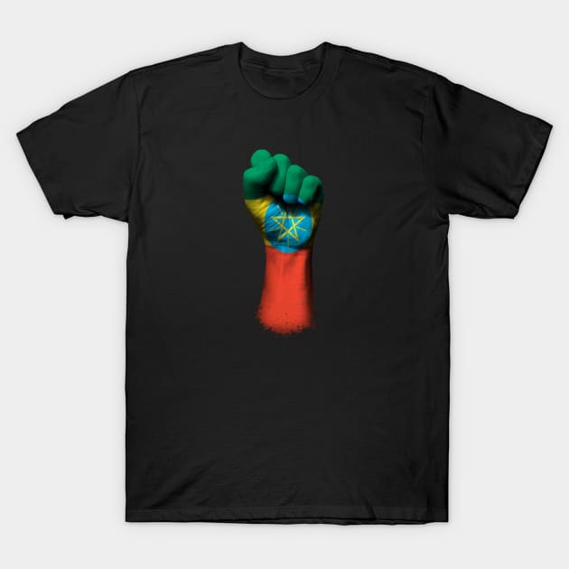 Flag of Ethiopia on a Raised Clenched Fist T-Shirt by jeffbartels